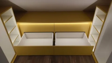 Dressing tiroirs et lumière en sous-pente