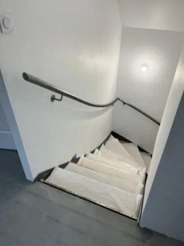 Escalier bois métal quart-tournant brut avec main courante